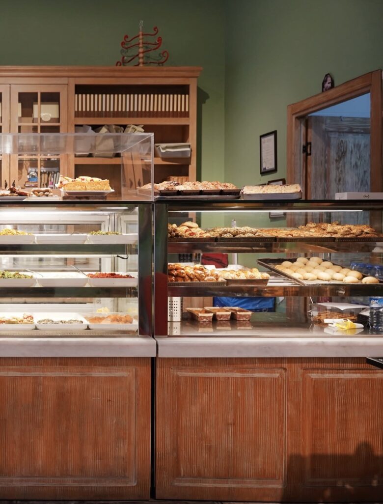 Display of freshly baked traditional Turkish pastries, buns, savory items, and sugar-free options at Ceviz Ev Yapımı.